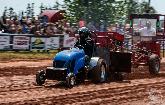 Dwight Horsnell driving Blue By You in the 1200 lb Modified Lawn Tractor class