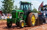 Johnny Wilson driving the John Deere 4450 in the 18,000 lb Stock Tractor class